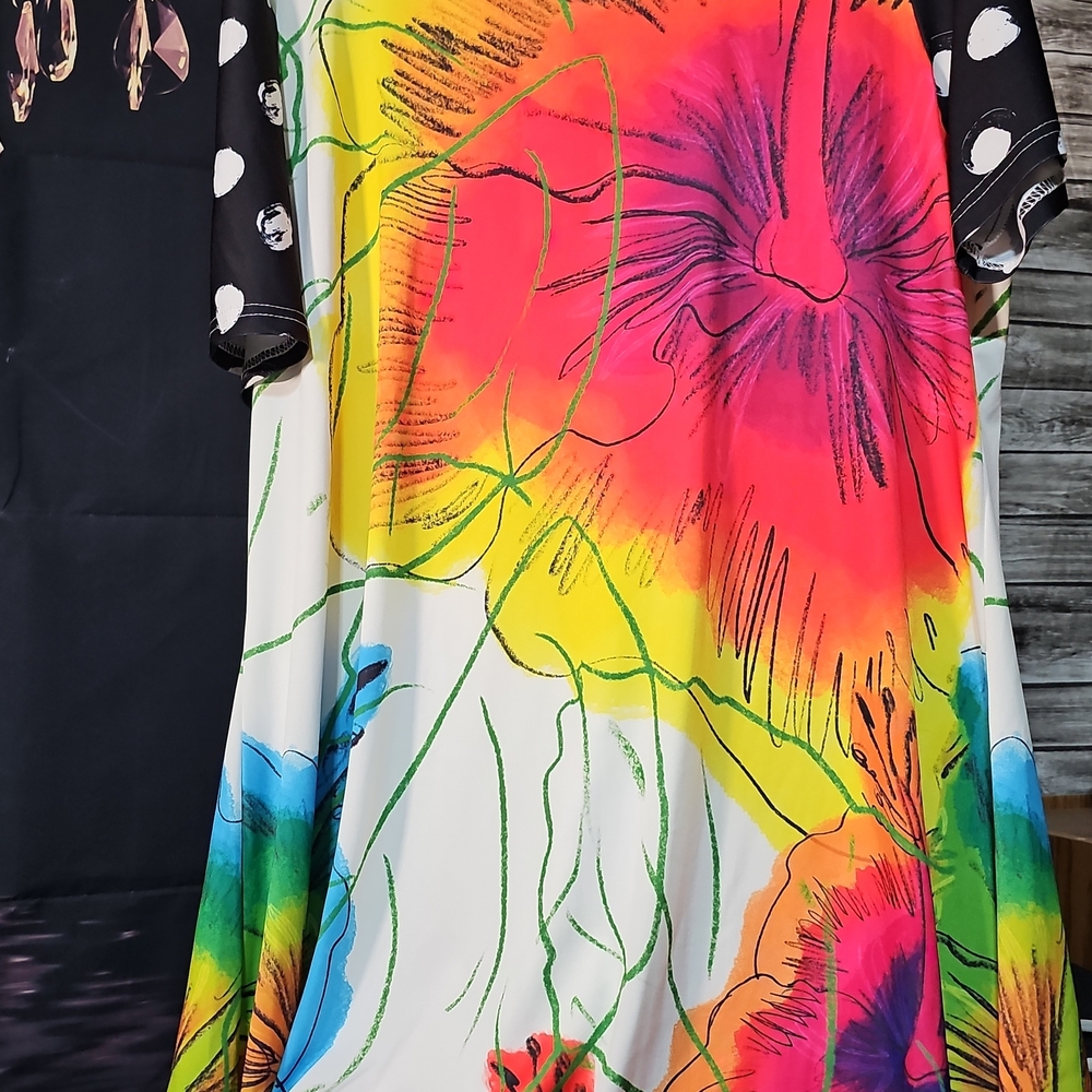 C003. Vibrant Floral Dress with Polka Dot Sleeves